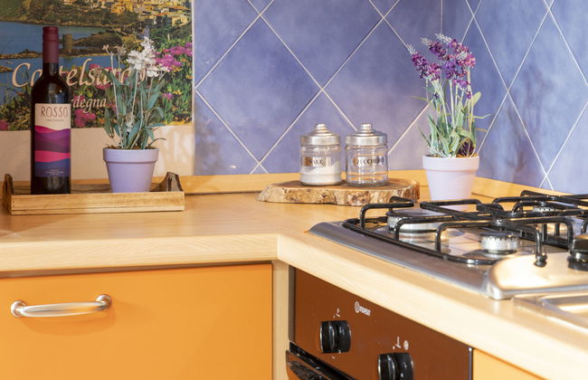 Apartamento de 2 quartos em Badesi com piscina e jardim - Foto 9