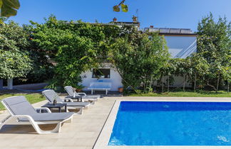 Photo 1 - Maison de 7 chambres à Umag avec piscine privée et jardin