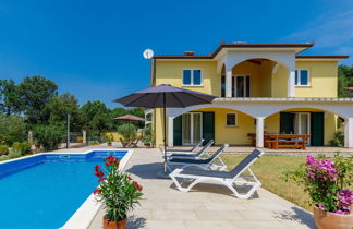 Photo 1 - Maison de 3 chambres à Labin avec piscine privée et vues à la mer