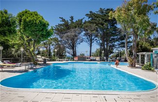 Foto 1 - Casa de 2 quartos em Livorno com piscina e vistas do mar