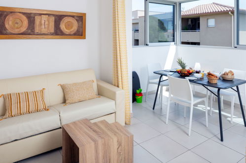 Foto 4 - Apartamento de 1 quarto em Santa-Lucia-di-Moriani com piscina e jardim