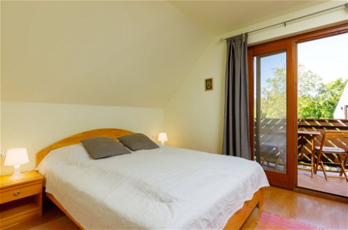 Foto 11 - Casa con 3 camere da letto a Balatonakali con giardino e vista sulle montagne