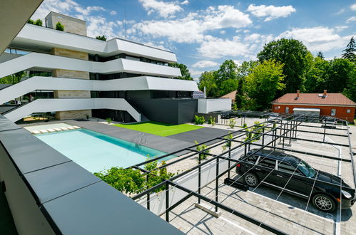 Foto 28 - Apartamento de 2 habitaciones en Balatonszemes con piscina y jardín