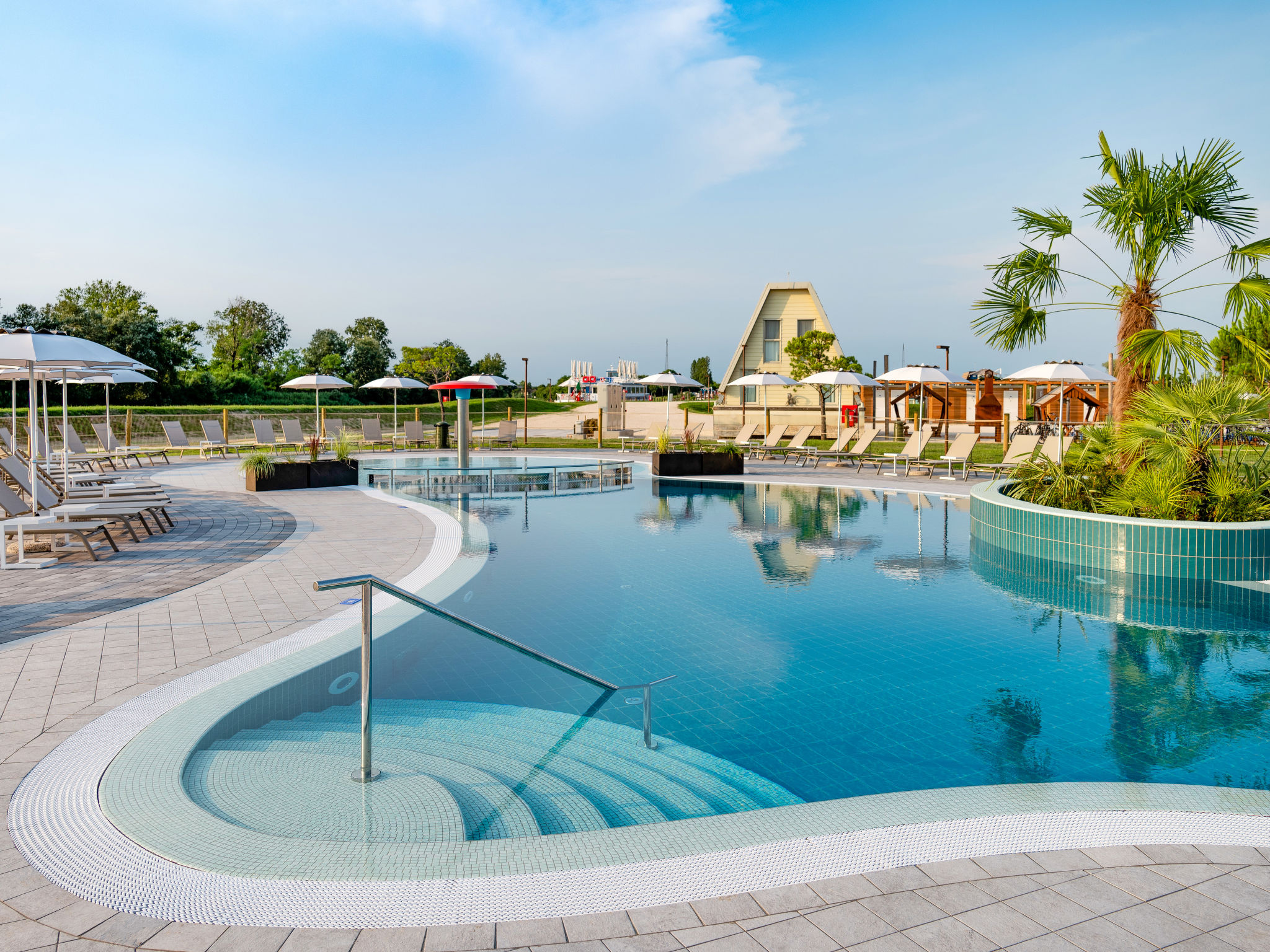 Photo 3 - Maison de 2 chambres à Lignano Sabbiadoro avec piscine et jardin