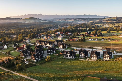 Foto 41 - Apartamento de 1 quarto em Bukowina Tatrzańska com piscina e vista para a montanha