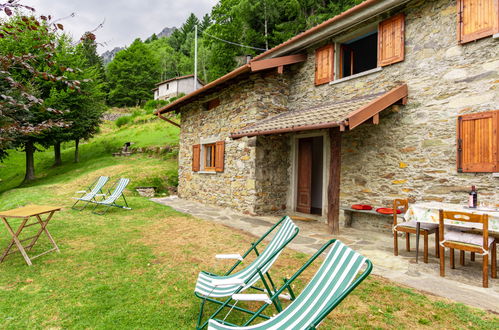 Photo 3 - Maison de 2 chambres à Plesio avec jardin et vues sur la montagne