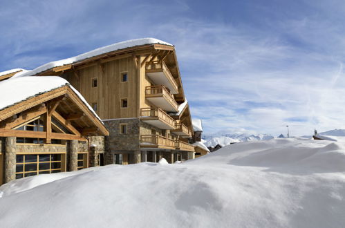 Foto 16 - Appartamento con 2 camere da letto a Huez con piscina e vista sulle montagne