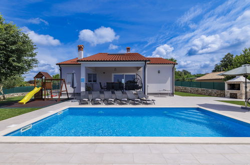 Photo 1 - Maison de 3 chambres à Žminj avec piscine privée et jardin