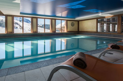 Foto 1 - Appartamento con 2 camere da letto a Le Grand-Bornand con piscina e sauna