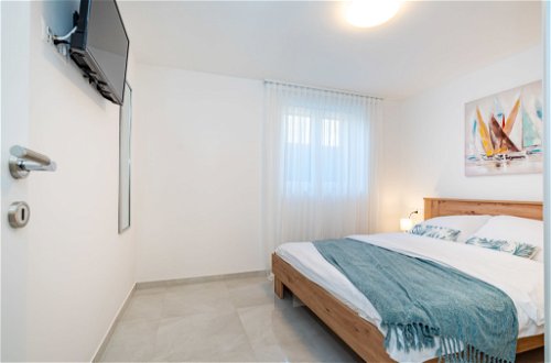 Foto 7 - Appartamento con 1 camera da letto a Novigrad con piscina e vista mare