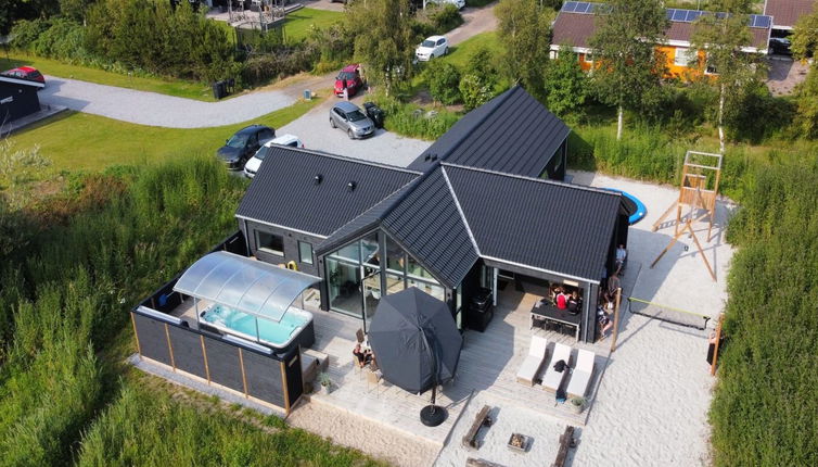 Foto 1 - Casa con 5 camere da letto a Strandby con terrazza e vasca idromassaggio