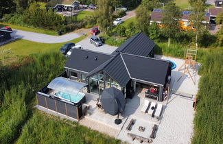 Photo 1 - Maison de 5 chambres à Strandby avec terrasse et bain à remous