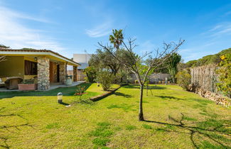 Photo 1 - Maison de 2 chambres à Villasimius avec jardin et terrasse