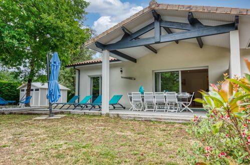 Foto 1 - Casa con 3 camere da letto a Grayan-et-l'Hôpital con giardino e vista mare