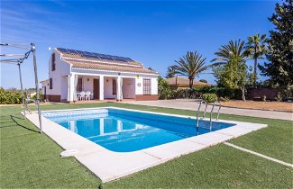 Foto 1 - Casa de 3 habitaciones en Sanlúcar la Mayor con piscina privada y jardín