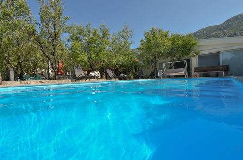 Photo 17 - Appartement de 2 chambres à Karlobag avec piscine et jardin