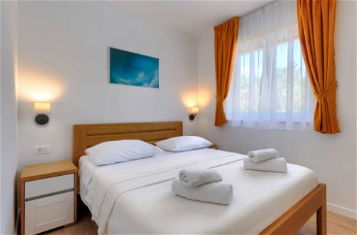 Foto 22 - Casa con 3 camere da letto a Raša con piscina privata e vista mare