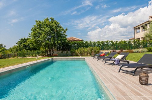 Foto 21 - Casa con 3 camere da letto a Tinjan con piscina privata e terrazza