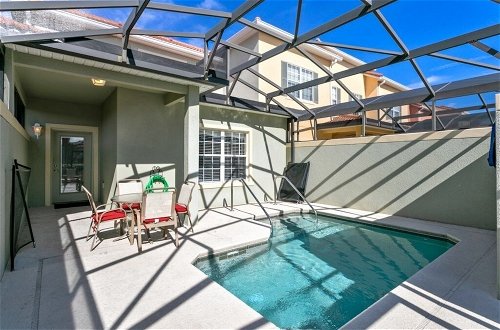 Photo 1 - 5 Bed 4 Bath Town With South Facing Pool 5 Bedroom Townhouse by RedAwning