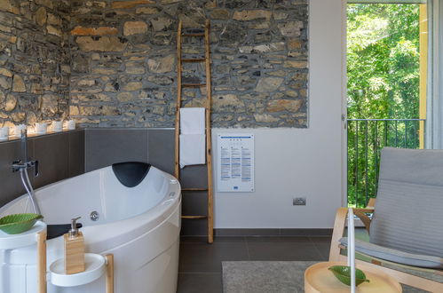 Photo 18 - Maison de 1 chambre à Perledo avec piscine privée et vues sur la montagne