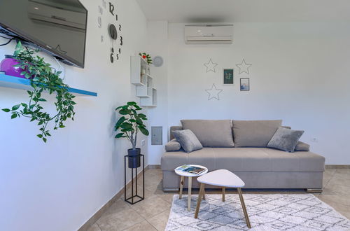 Photo 3 - Maison de 1 chambre à Fažana avec jardin et terrasse