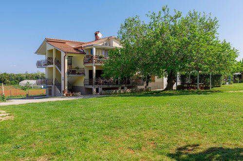 Photo 1 - Appartement de 1 chambre à Umag avec jardin et vues à la mer