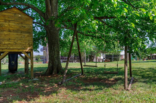 Foto 13 - Appartamento con 1 camera da letto a Umag con giardino e terrazza