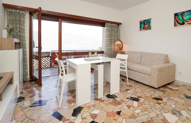 Apartamento de 1 quarto em Brezzo di Bedero com piscina e jardim - Foto 9