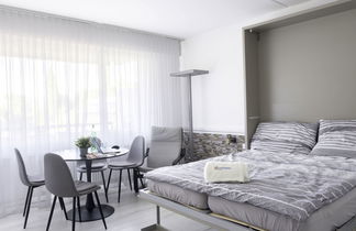 Foto 3 - Apartamento de 1 quarto em Bissone com piscina e jardim