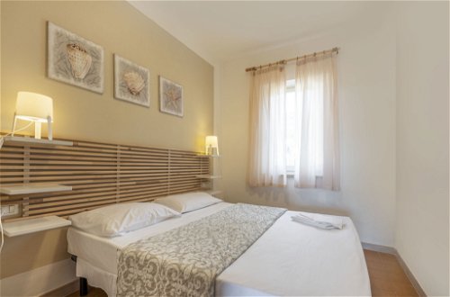 Photo 17 - Appartement de 2 chambres à Capoliveri avec jardin et vues à la mer