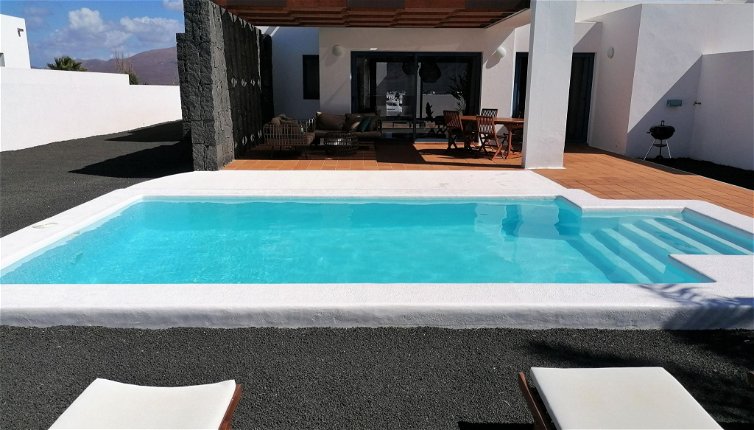 Foto 1 - Casa con 2 camere da letto a Yaiza con piscina privata e vista mare