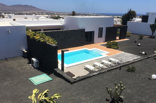 Photo 1 - Maison de 3 chambres à Yaiza avec piscine privée et vues à la mer