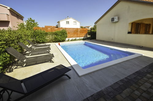 Photo 30 - Maison de 3 chambres à Biograd na Moru avec piscine privée et vues à la mer