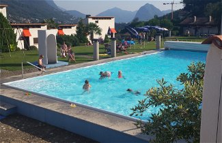 Foto 1 - Apartamento en Capriasca con piscina y vistas a la montaña