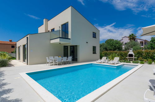 Photo 7 - Maison de 3 chambres à Pula avec piscine privée et jardin