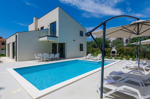 Foto 48 - Haus mit 3 Schlafzimmern in Pula mit privater pool und garten