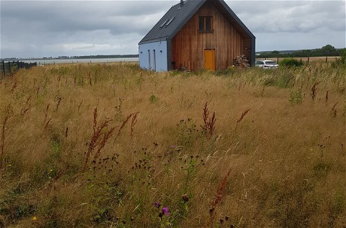 Photo 1 - Maison de 2 chambres à Darłowo (Gmina) avec jardin et vues à la mer