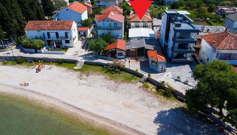 Photo 1 - Appartement de 2 chambres à Sukošan avec vues à la mer