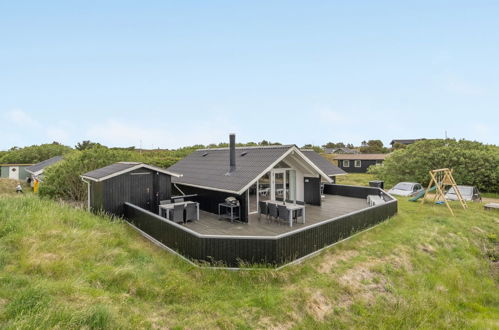 Photo 1 - Maison de 3 chambres à Rindby Strand avec terrasse et bain à remous