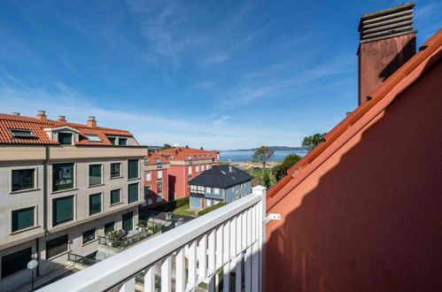 Photo 2 - Appartement de 2 chambres à Miño avec terrasse et vues à la mer