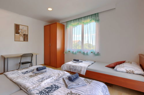 Foto 35 - Appartamento con 3 camere da letto a Labin con piscina privata e vista mare