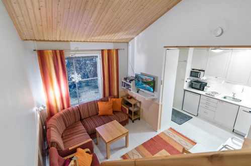 Foto 14 - Haus mit 1 Schlafzimmer in Kolari mit sauna und blick auf die berge