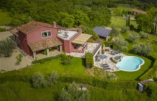 Foto 1 - Casa de 3 habitaciones en Passignano sul Trasimeno con piscina privada y vistas a la montaña