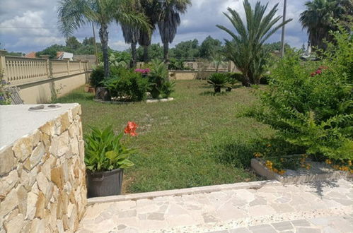 Photo 41 - Maison de 5 chambres à Torricella avec jardin et terrasse