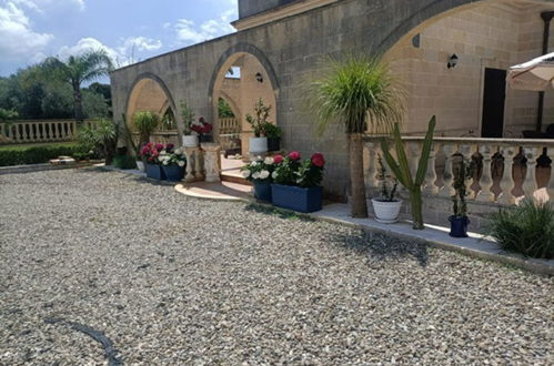 Photo 52 - Maison de 5 chambres à Torricella avec jardin et vues à la mer