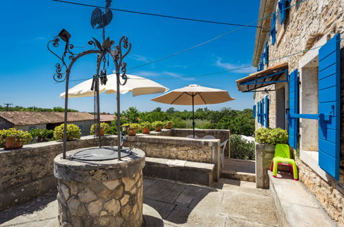 Photo 15 - Maison de 3 chambres à Sveti Lovreč avec piscine privée et vues à la mer