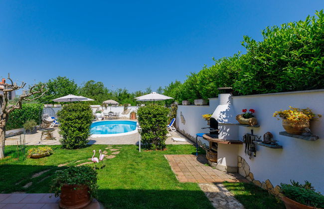 Apartamento de 3 quartos em Umag com piscina e jardim - Foto 18