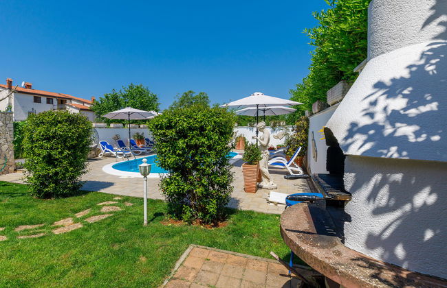 Apartamento de 3 quartos em Umag com piscina e jardim - Foto 5