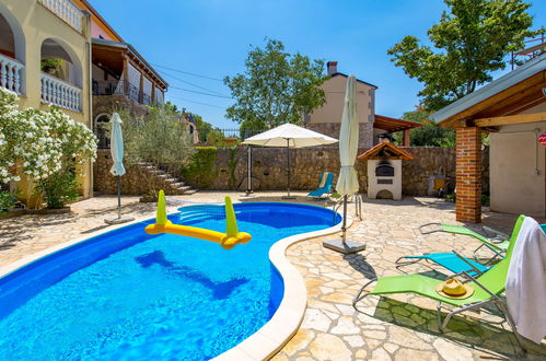 Photo 1 - Maison de 2 chambres à Dobrinj avec piscine et vues à la mer