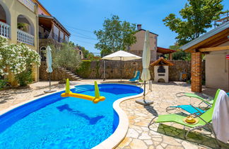 Photo 1 - 2 bedroom House in Dobrinj with swimming pool and sea view